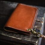 Leather trucker wallet mid Brown eyelet lanyard